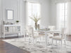 Ashley Furniture Chalanna dining room set with a wooden table and matching chairs, shown in a modern dining room setting.