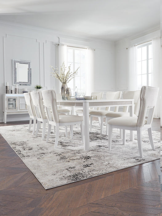 Ashley Furniture Chalanna Dining Package with a modern dining room set featuring a wooden table and matching chairs.