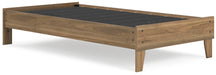Ashley Furniture Deanlow Bed with wooden frame and modern design, shown from an angled view in a bedroom setting.