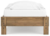 Ashley Furniture Deanlow Bed with a sturdy wooden frame and headboard, shown from the back in a stylish bedroom setting.