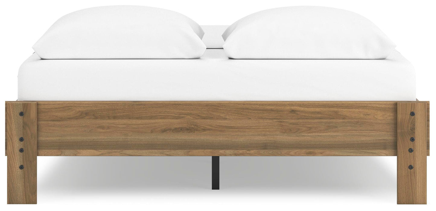 Ashley Furniture Deanlow Bed with a dark wood finish and modern design, shown in a well-lit bedroom setting.