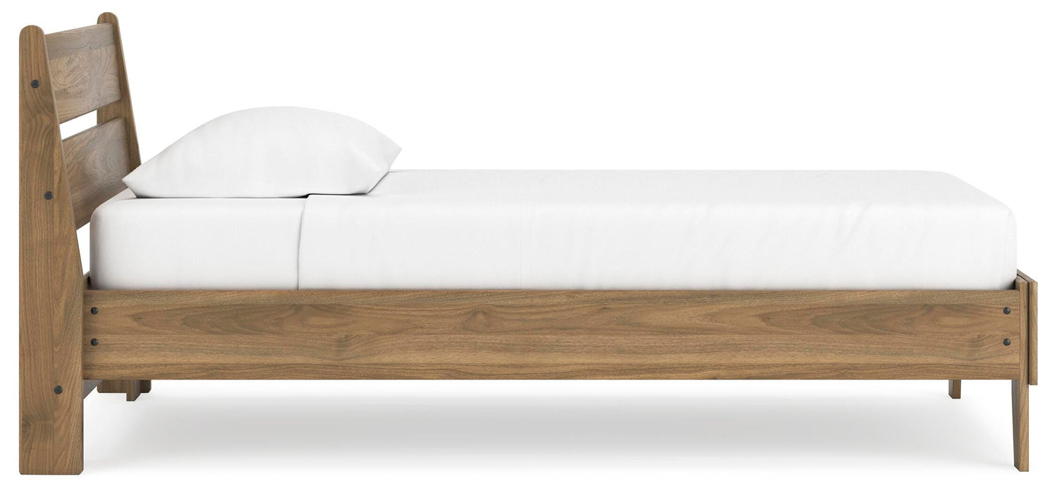 Ashley Furniture Deanlow Bed with a sturdy wooden frame and side panels, showcasing a modern bedroom design.