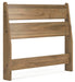 Ashley Furniture Deanlow Bed with a modern wooden frame and angled headboard, shown from a side angle.