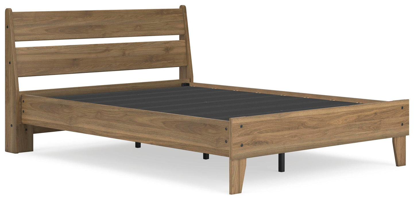 Ashley Furniture Deanlow Bed in a stylish bedroom setting, showcasing the bed's modern design and wooden finish.