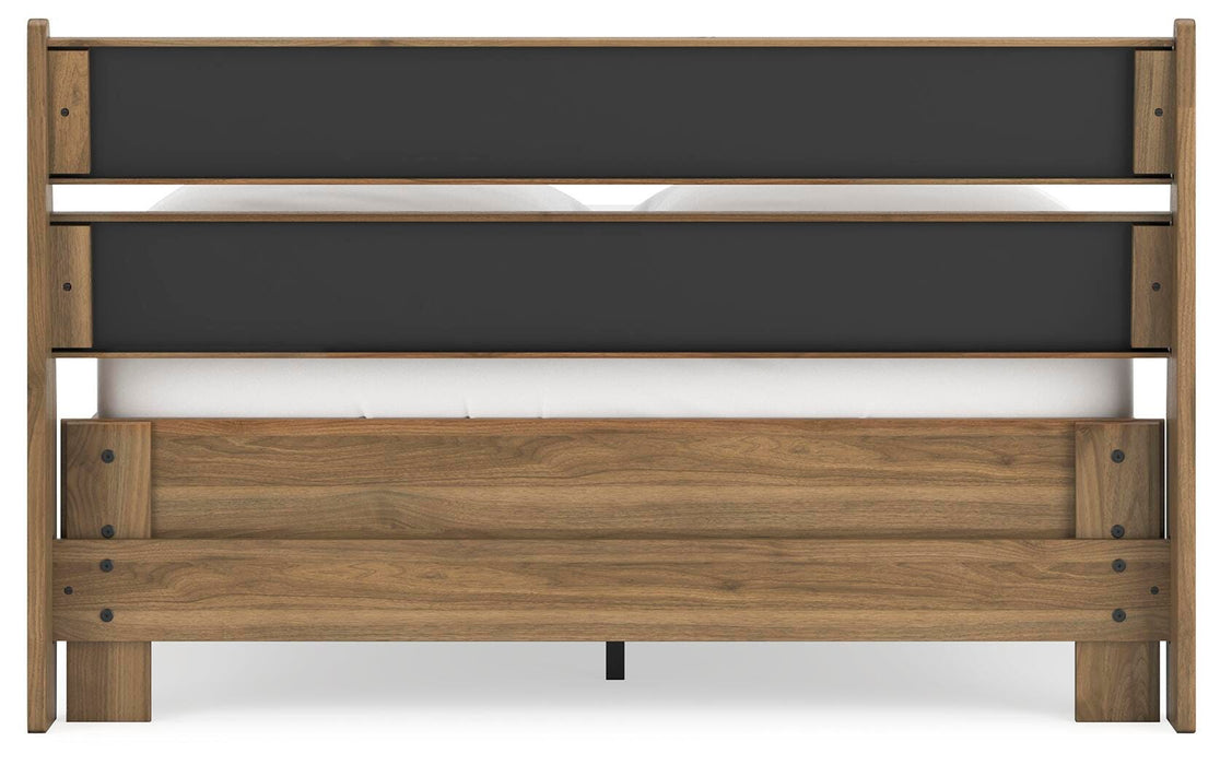 Ashley Furniture Deanlow Bed with a sturdy wooden frame and elegant design, shown from the back in this detailed image.