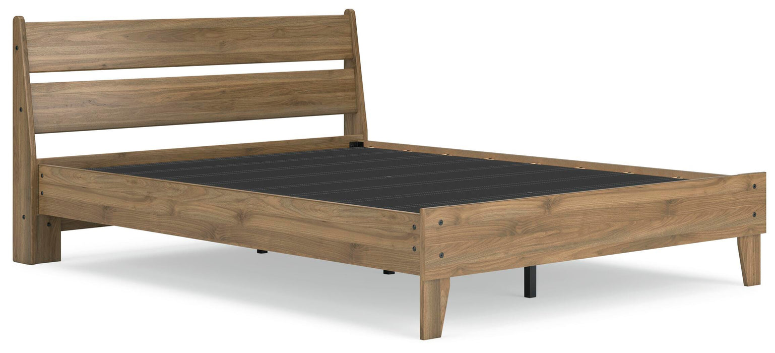 Ashley Furniture Deanlow Bed with a modern wooden frame, shown from a side angle in a stylish bedroom setting.