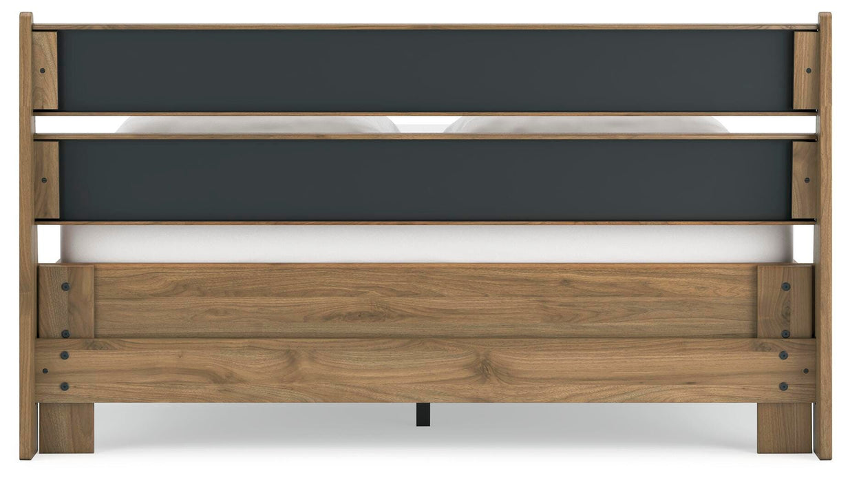 Ashley Furniture Deanlow Bed with a sturdy wooden frame and a dark finish, shown from the back view.