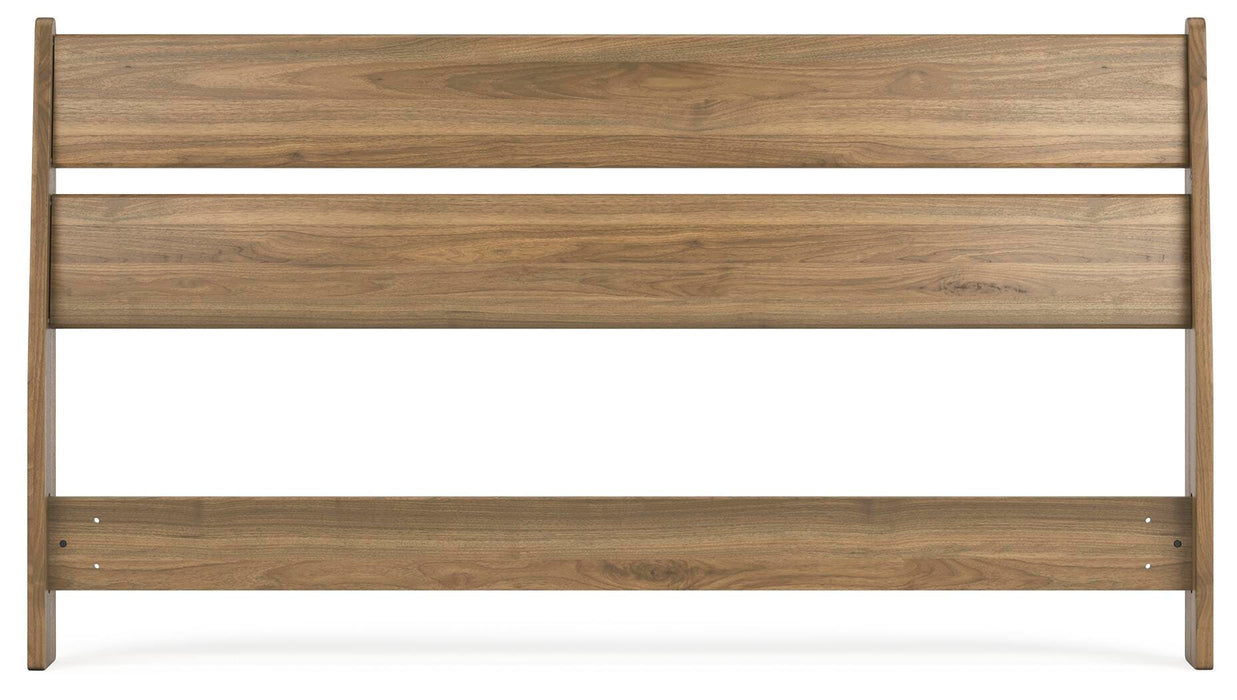 Ashley Furniture Deanlow Bed with a sleek headboard and modern design, shown from a front view in a bedroom setting.