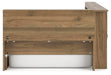 Ashley Furniture Deanlow Bed with a dark wooden frame and decorative headboard, shown from the back.