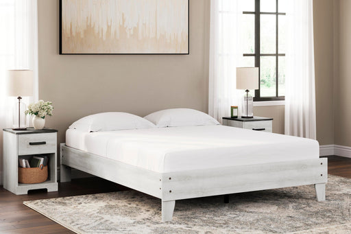 Ashley Furniture Shawburn Queen Platform Bed with wood finish and modern design, featuring a sturdy frame and clean lines.