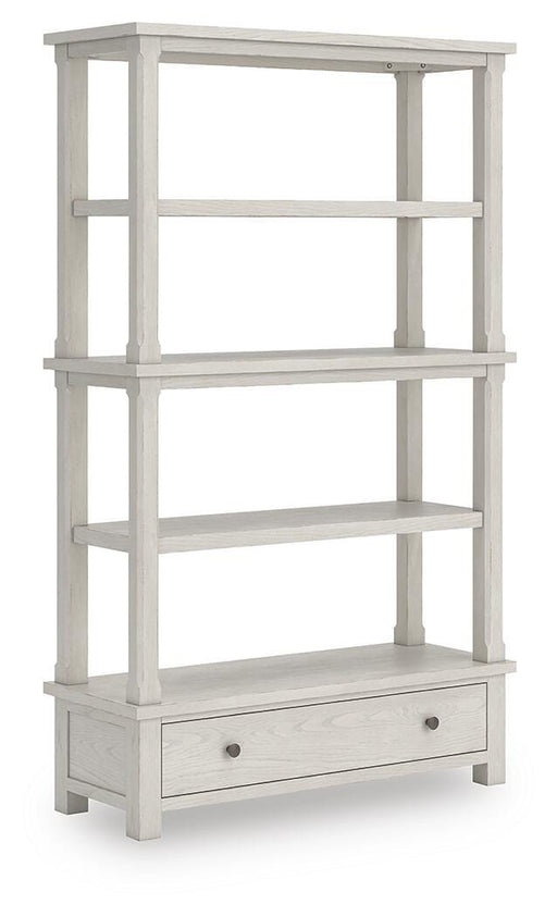 Ashley Furniture Robbinsdale 75-inch wood bookcase with open shelves, angled side panels, and a warm finish.