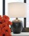 Ashley Furniture Ladstow Table Lamp Set featuring two stylish lamps with fabric shades and wooden bases for elegant lighting.