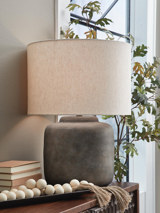Ashley Furniture Zandophen table lamp with a sleek design and fabric shade, perfect for living room or bedside decor.