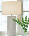 Ashley Furniture Bradard Lamp Set with two stylish table lamps featuring neutral shades and modern bases.