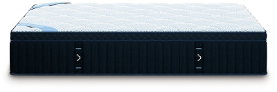 DreamCloud Hybrid Premier 4.0 mattress shown from the side, featuring plush top and supportive base for comfortable sleep.