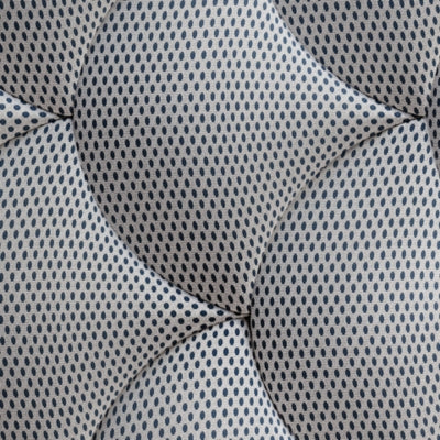 DreamCloud Hybrid Premier 4.0 mattress showing its plush, quilted surface with a neutral-colored fabric cover and supportive design.