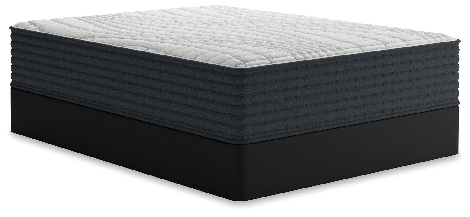 Ashley Furniture Hybrid 1300 mattress shown from an angle, featuring a plush top and supportive base for comfortable sleep.