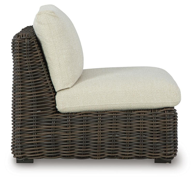 Ashley Furniture Kimora outdoor sectional with cushioned seats and stylish design, perfect for patio or garden seating.