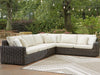 Ashley Furniture Kimora outdoor sectional with cushioned seating and modern design, suitable for patio or backyard outdoor space.