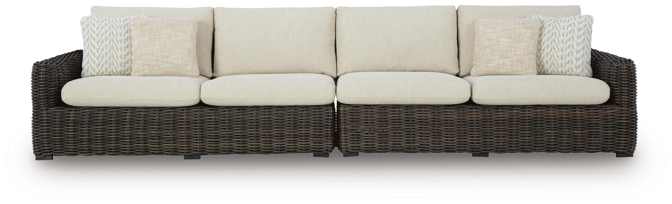 Ashley Furniture Kimora outdoor sectional with beige cushions and stylish woven rattan frame, perfect for patio seating.