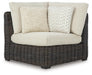 Ashley Furniture Kimora outdoor sectional with plush cushions and modern design, perfect for outdoor seating on a patio or garden.