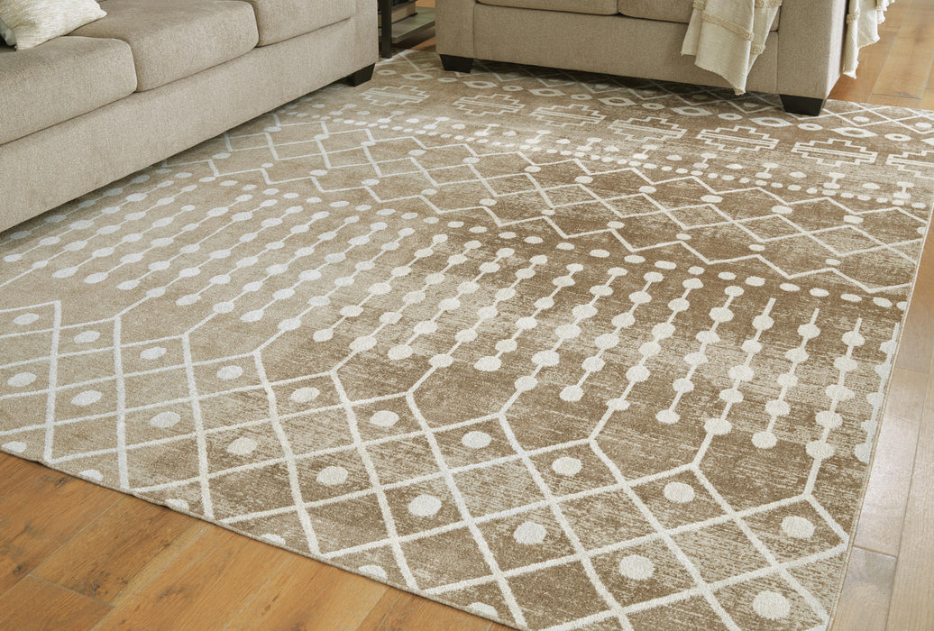 Ashley Furniture Bunchly 8x10 rug with intricate pattern in neutral tones, perfect for living room or bedroom decor.