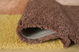 Close-up of the Ashley Furniture Gailmore Rug showing its detailed woven pattern and rich texture in neutral tones.