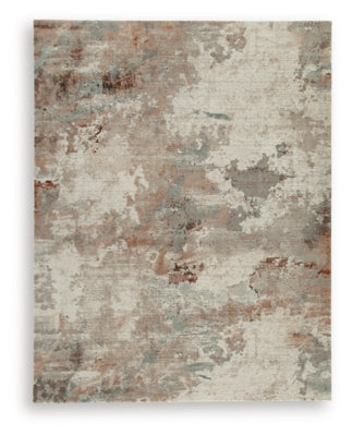 Ashley Furniture Jadenburg Rug with intricate pattern and soft texture, perfect for enhancing living room decor.