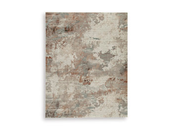 Ashley Furniture Jadenburg Rug with intricate patterns and neutral tones, perfect for adding style to living spaces.