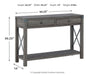 Ashley Furniture Freedan sofa console table with a sleek wooden surface and modern design, perfect for living room decor.