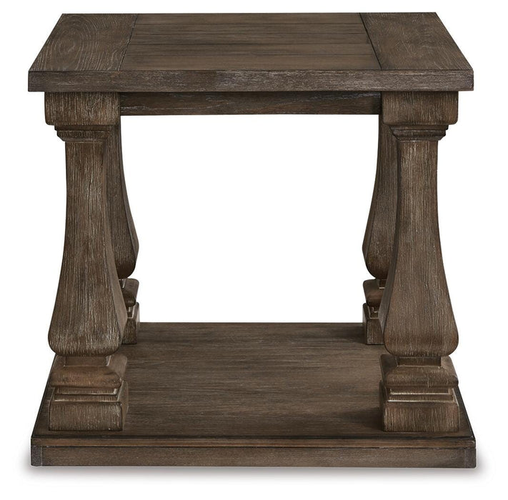 Ashley Furniture Johnelle end table with a wooden finish and simple design, shown from a head-on angle.