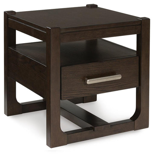 Ashley Furniture Breckington End Table with a dark wood finish and angled legs, shown from an angled side view.
