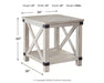 Ashley Furniture Carynhurst end table with a wooden top and tapered legs, showcasing a classic and elegant design.