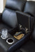 Ashley Furniture 5Z-Relaxation Power Reclining Loveseat with Console, showing plush fabric, reclining mechanism, and built-in console.