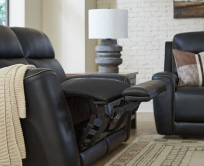 Ashley Furniture 5Z-Relaxation power reclining loveseat with console, showing plush fabric, armrests, and built-in cup holders.