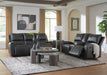 Ashley Furniture Glossmore reclining living room set with plush cushions and reclining chairs in a modern design.