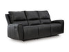 Ashley Furniture Glossmore reclining living room set with a sofa and chaise, shown from an angled view.