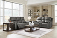 Ashley Furniture Bleckley reclining living room set with sofa and loveseat featuring plush cushions and reclining seats.