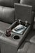 Close-up of the Ashley Furniture Bleckley Reclining Living Room Set console with detailed wood finish and plush upholstery.