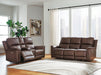 Ashley Furniture Bleckley reclining living room set with plush sofas and chairs, featuring neutral upholstery and comfortable design.