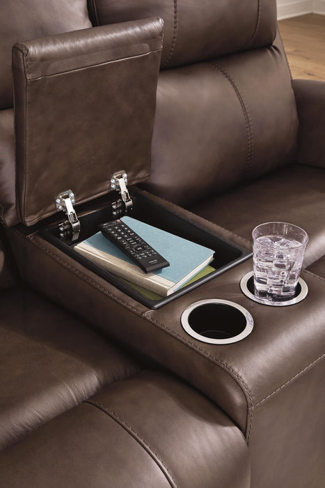 Close-up of Ashley Furniture Bleckley Reclining Living Room Set with detailed console and plush upholstery.