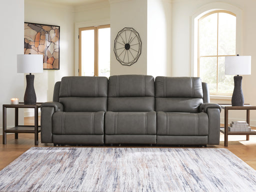 Ashley Furniture 5Z Pittson sectional reclining sofa with plush cushions, fabric upholstery, and multiple reclining seats.