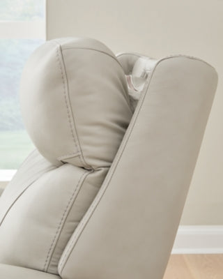 Ashley Furniture Pincara Power AutoGlide Recliner with plush cushioning and adjustable headrest, shown in a living room setting.