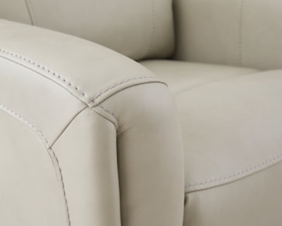 Ashley Furniture Pincara Power AutoGlide Recliner with jumbo stitching upholstery, featuring plush cushioning and a sleek design.