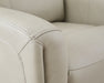 Ashley Furniture Pincara Power AutoGlide Recliner with jumbo stitching upholstery, featuring plush cushioning and a sleek design.