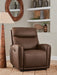 Ashley Furniture Pincara Power AutoGlide recliner in dark fabric, showing plush cushioning and built-in reclining mechanism.