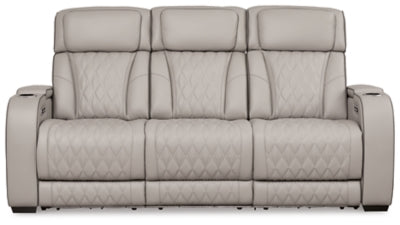 Ashley Furniture Boyington Power Reclining Sofa with plush cushions and reclining armrests, shown from a front head-on view.